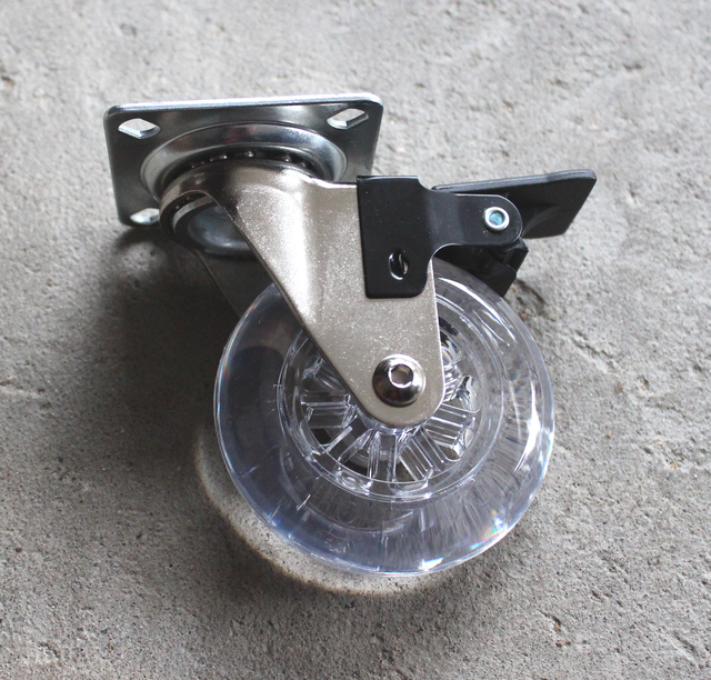 Inventarhjul Ø75 mm med bremse, transparent plastik